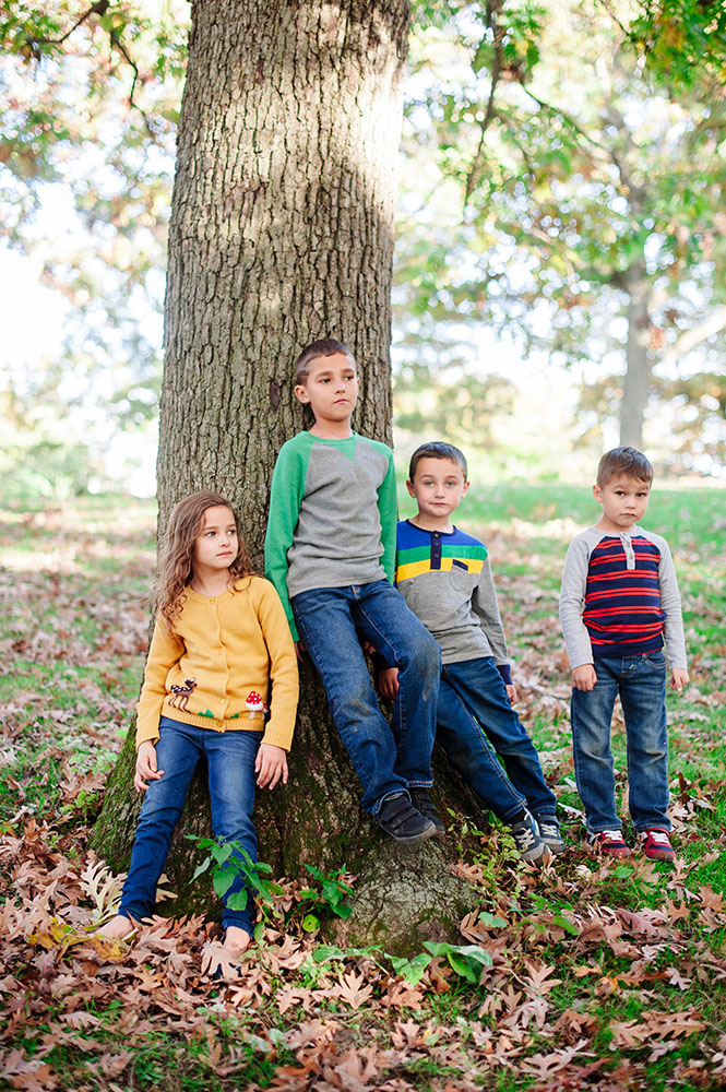 portrait of 4 kids in the Fall