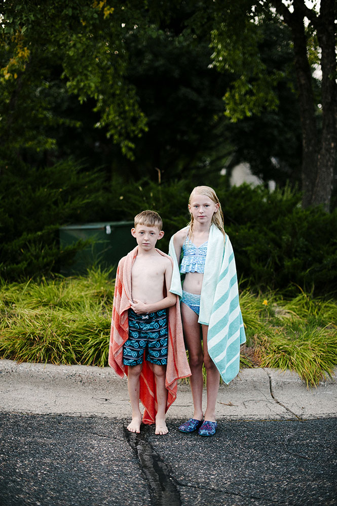 two kids in swimsuits