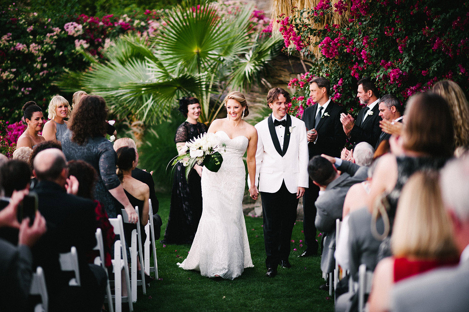 Married couple walking down the aisle in Palm Springs California
