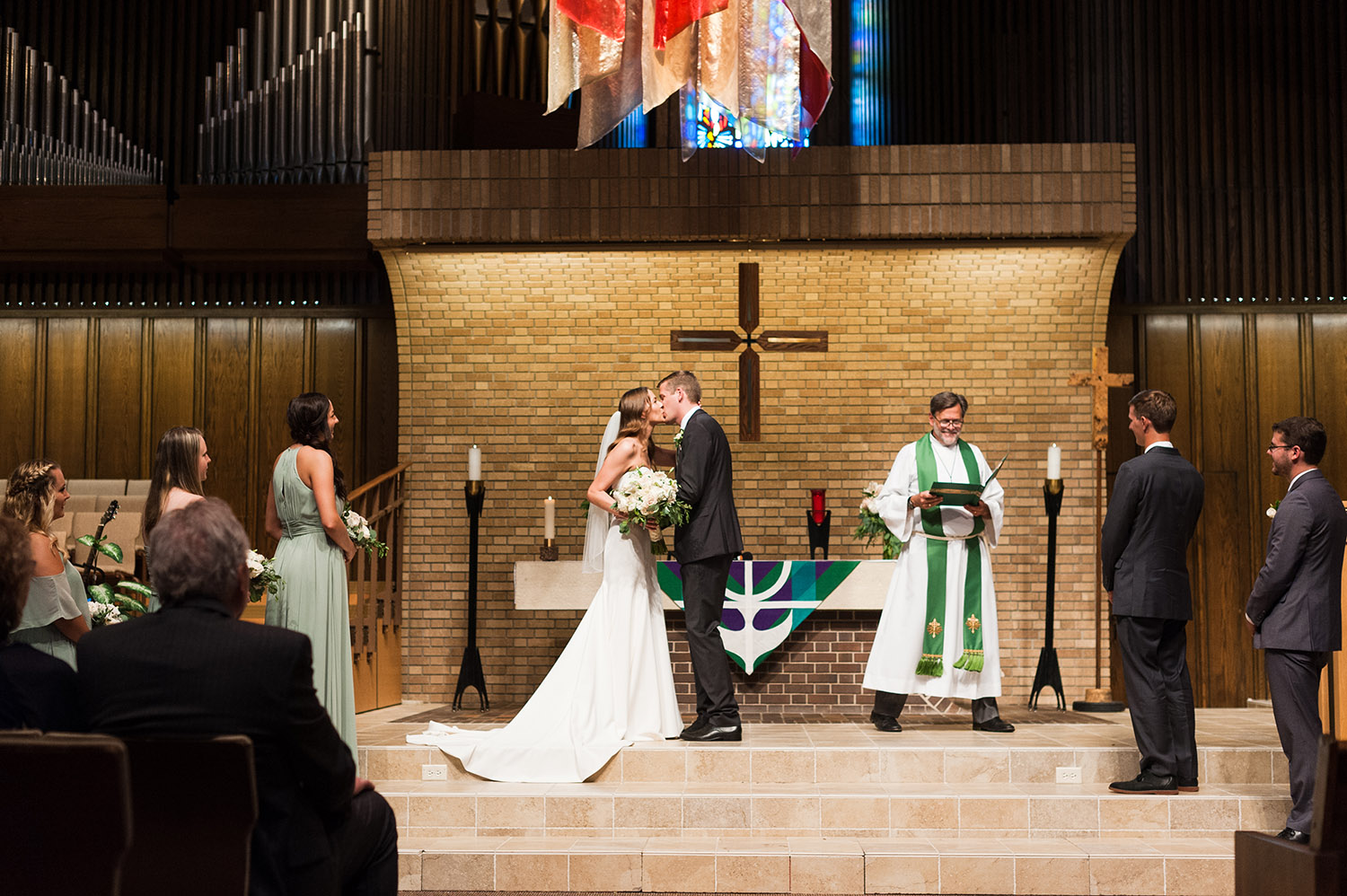 bride and groom getting married in a church